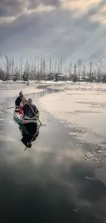 Serene winter lake with boat in misty atmosphere.