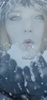 Woman in winter blowing snowflakes in gloves.