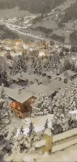 Snowy mountain village illuminated at night.