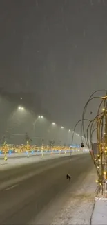 Snow-covered road lit by streetlights and festive string lights at night.