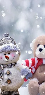 Plush snowman and bear in winter snow scene.