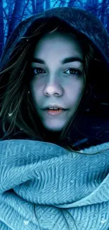 Serene blue-toned winter portrait wallpaper.