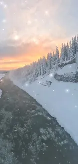 Winter river under sunset with snowy trees.