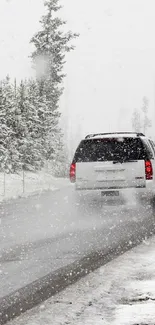 Snow-covered road through a forest in winter.
