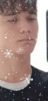 Selfie wallpaper with snowflakes overlay on a mobile background.