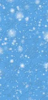 Blue wallpaper with intricate snowflakes and a winter theme.