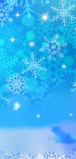 Winter snowflake wallpaper with blue and white hues.