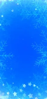 Blue wallpaper with snowflakes and stars.