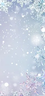 Winter snowflake mobile wallpaper with soft blue background.