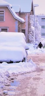 Urban street covered in winter snow, with cars and houses visible.