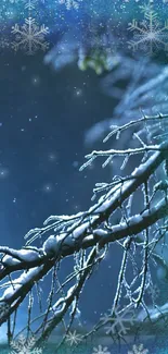 Snow-covered branches with snowflakes on a blue background.