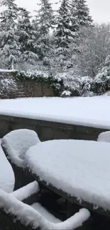 Snow-covered patio in a serene winter landscape.