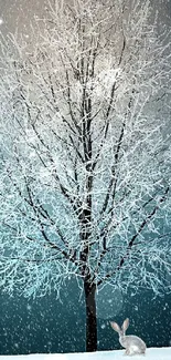 Magical winter tree with snow falling in a peaceful, snowy landscape.