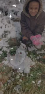 Child enjoying winter, building a small snowman with sparkles.