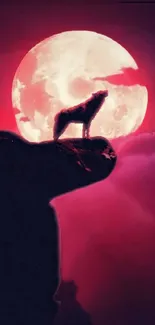 Silhouette of a howling wolf against a crimson moon night sky.