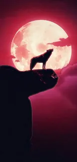 Silhouetted wolf howling against a vivid full moon in a dramatic night scene.