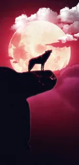 Silhouette of a wolf howling at a full red moon in a dark sky.