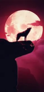 Silhouetted wolf howling at the moon with magenta sky.