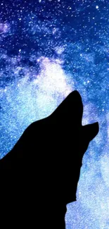 Silhouette of a wolf howling against a starry galaxy sky.