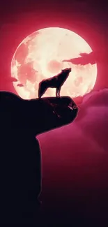 Silhouette of a wolf with a crimson moon backdrop.