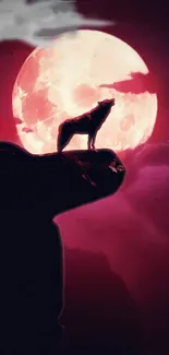 Wolf silhouette with pink moon background, creating a mysterious night scene.