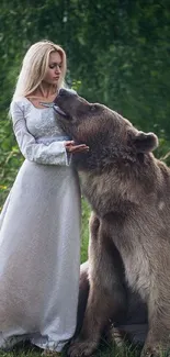 Woman in white dress with bear in green forest.