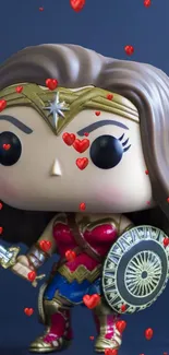 Wonder-themed vinyl doll with hearts and sword on dark blue background.