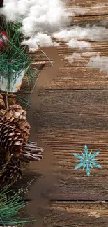 Winter holiday wallpaper with wood, pine cones, and festive decor.