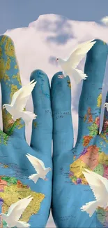 Hands painted as a world map with doves flying around.