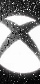 Xbox logo with rain effect on a black background. Stylish and modern design.