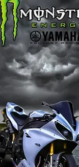 Yamaha Monster Energy motorcycle under stormy sky.