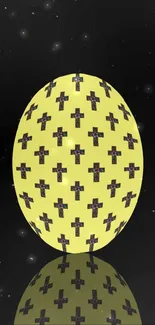 Yellow sphere with cross pattern against cosmic background.