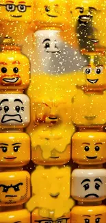 Yellow LEGO brick faces with various expressions as a mobile wallpaper.