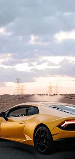 Yellow sports car driving in desert backdrop.