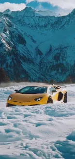 Yellow sports car in snowy mountain landscape scene.