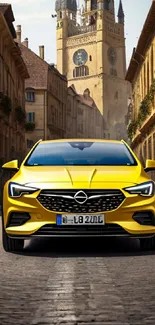 Vibrant yellow car on cobblestone street with historic architecture.