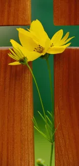 Yellow flower on wooden cross wallpaper with serene vibes.