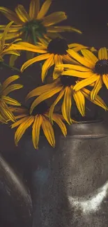 Yellow daisies in a rustic watering can against a dark background.