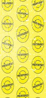 Yellow wallpaper with circular stereo logo repeating pattern.