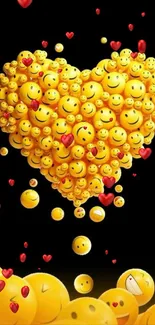 Bright yellow smiley heart on black background wallpaper.