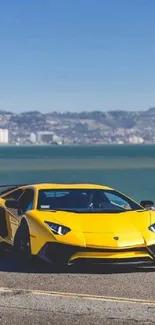 Yellow sports car parked by the coastal seaside under blue sky.