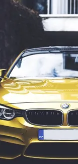 Yellow sports car parked in modern setting.