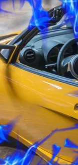 Yellow sports car interior with blue flames on mobile wallpaper.