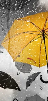 Yellow umbrella amidst black umbrellas on a cloudy sky background.