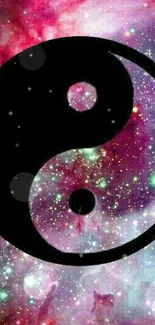 Yin Yang symbol on a colorful galaxy background.