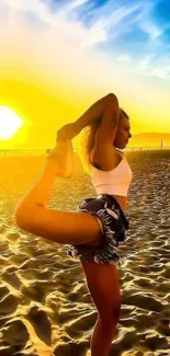 Yoga pose at sunset on a sandy beach with vibrant colors.