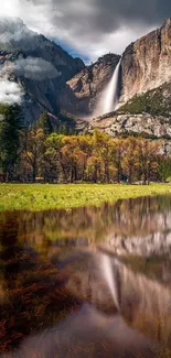 Yosemite waterfall with vibrant reflections in serene landscape.