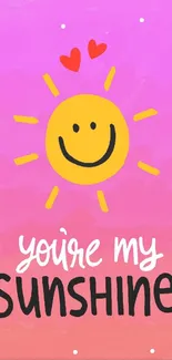 Cheerful mobile wallpaper with a smiling sun and pink background.